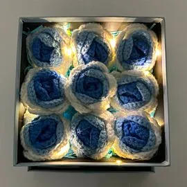 9 blue crochet roses in light up square flower box