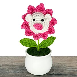 pink crochet pig sunflower in a pot