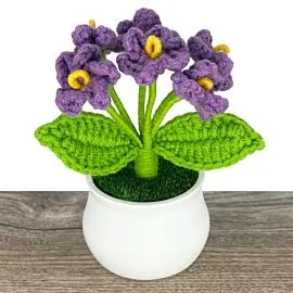 Purple Crochet forget me not flowers in pot