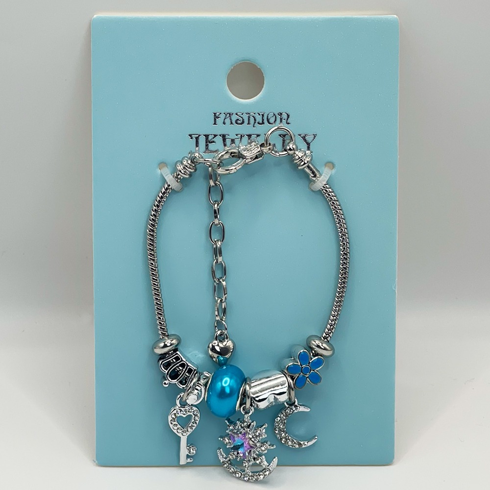 AdjustAblE StAinlEss StEEl ChArm BrAcElEt with OcEAn BluE STAR DEsign 