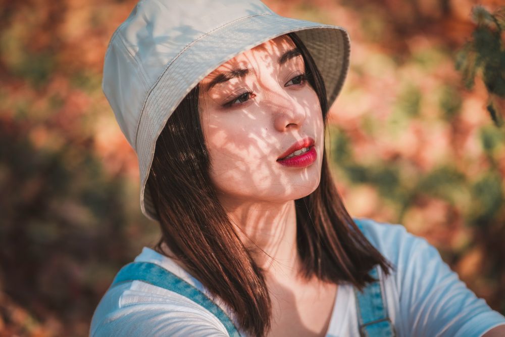 bucket hat with short hair woman